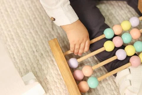 Child's hand playing Stock Photos