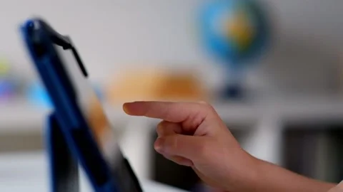 Child's Hand Playing with Tablet PC Stock Footage 90369037