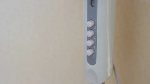 The child's hand presses the button Stock Footage 85692196