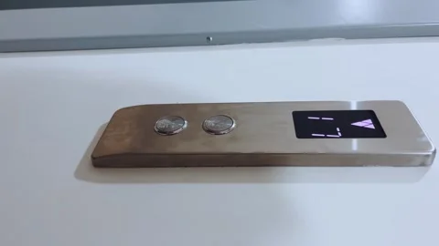 A child's hand presses the elevator button, vertical shooting Stock Footage 255005892