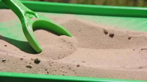 Child's hand scapula sand Video stock 84302556