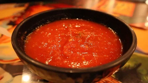 Child's Hand Scooping Chip in Salsa in Mexican Restaurant in USA Vídeos de archivo 126945578