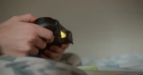 Child's Hands Holding Gaming Controller Close up Stock Footage 331597780