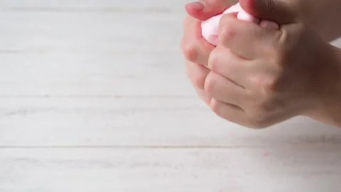 The Child's Hands Mince and Pull Slime. Stock Footage 170188731
