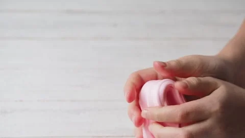 The Child's Hands Mince and Pull Slime. Stock Footage 170188740