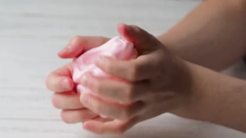 The Child's Hands Mince and Pull Slime. Stock Footage 170188777