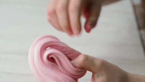 The Child's Hands Mince and Pull Slime. Stock Footage 170188782