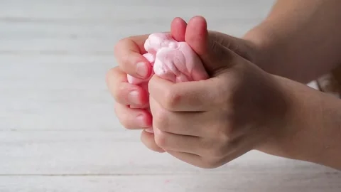 The Child's Hands Mince and Pull Slime. Stock Footage 170188785