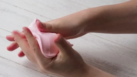 The Child's Hands Mince and Pull Slime. Stock Footage 170188791