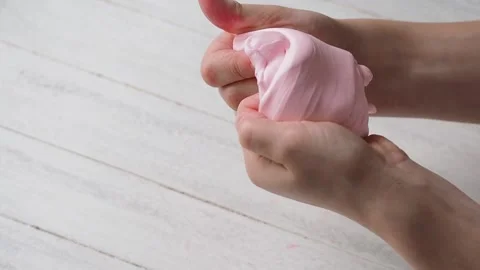 The Child's Hands Mince and Pull Slime. Stock Footage 170188796