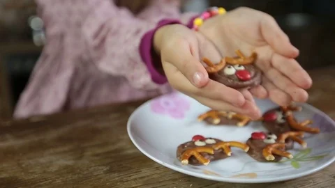 Child's hands offering delicious homemade cookie Stock Footage