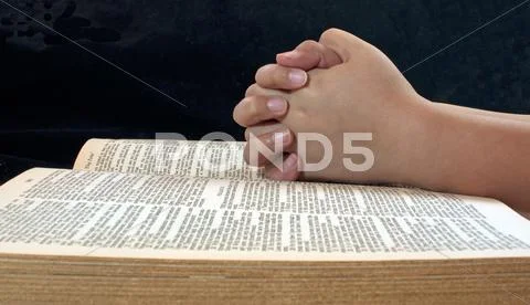 Child's hands praying Stock Photos