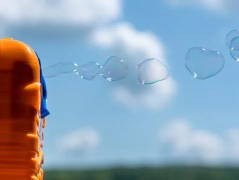 Childs mechanical soap bubble maker or blower Stock Photos