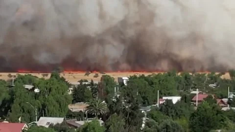 Chile: Massive Wildfire Triggers Red Alert in Santiago Metropolitan Regio... Stock Footage 294354252