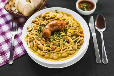 Chilean beans with rustic sausage on a typical chilean table Stock Photos