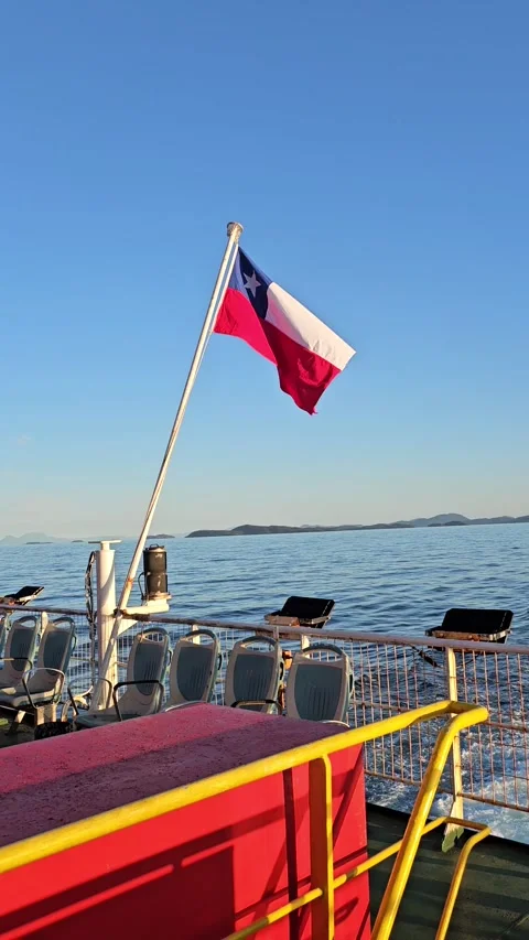 Chilean Flag Waving in the Wind – Ferry to Chiloé Stock Footage 293747710