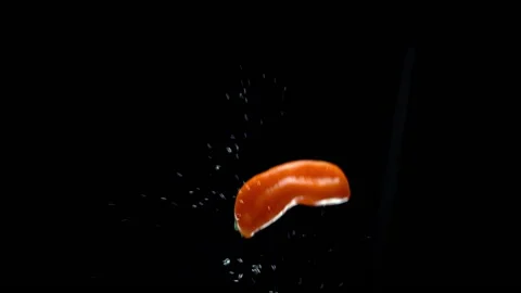 Chili exploding in mid flight Stock Footage 165216431