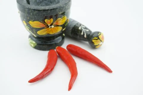 Chili with mortar Stock Photos