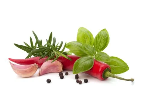 Chili pepper and flavoring herbs Stock Photos