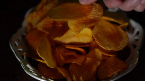 Chili potato chips on the table Stock Footage 261741474