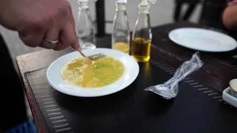 Chili sauce being prepared at the pub dinner table. Stock Footage 139851110