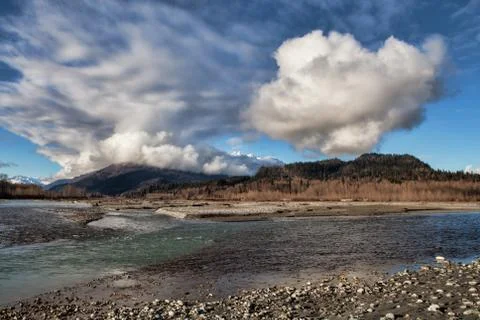 Chilkat river with clouds Stock Photos