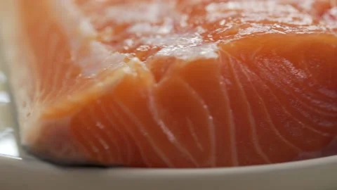 Chilled red fish steaks on a plate Stock Footage 205590780