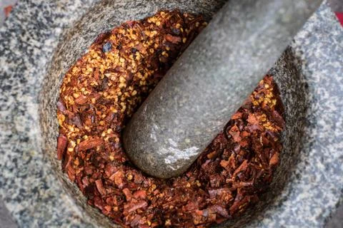 Chilli dry in the mortar Stock Photos