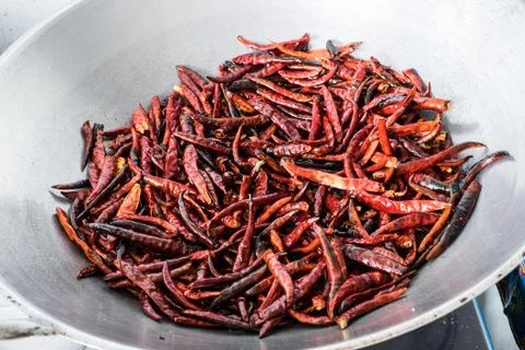 Chilli dry in the pan Stock Photos