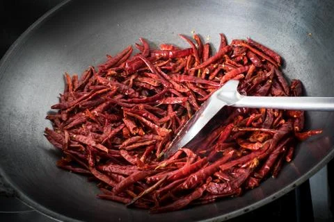 Chilli dry in the pan Stock Photos