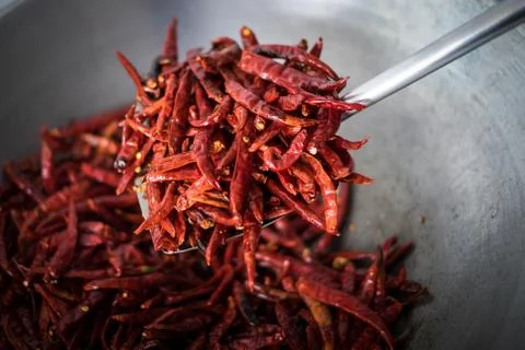 Chilli dry in the pan Stock Photos