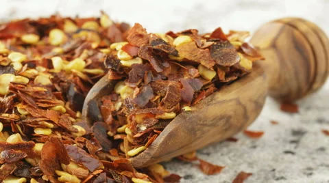 Chilli flakes - crushed chillis. Stock Footage 62699310