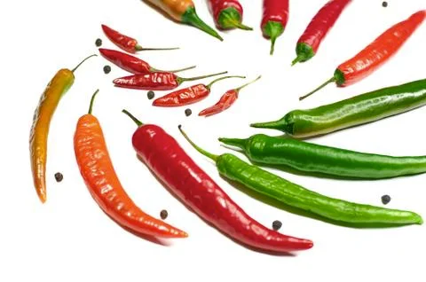 Chilli hot on a white background close-up in a circle from the top side Stock Photos