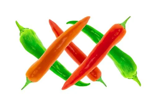 Chilli pattern spicy bright red pod on green crossed on an isolated backgroun Stock Photos