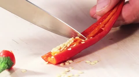 A chilli pepper being deseeded Stock Footage 24673267