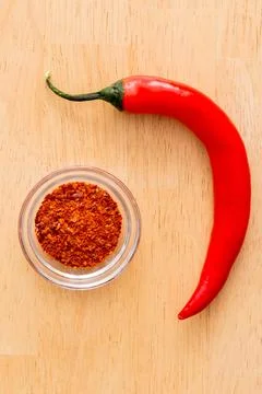 Chilli Peppers with Chilli Powder Stock Photos