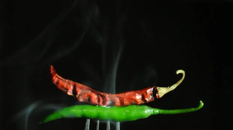 Chilli peppers with smoke Stock Footage 38867792