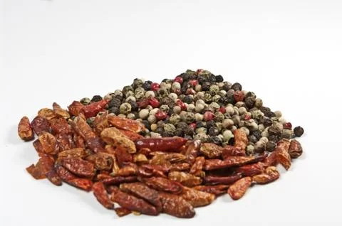 Chilli und Pfefferkörner Stock Photos