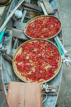 Chillies drying outside Stock Photos