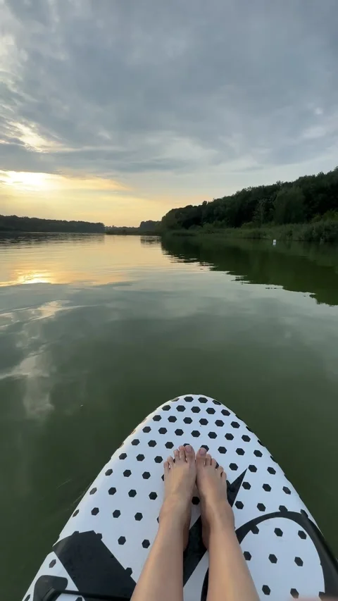 Chilling on supboard on sunset Stock Footage 252881488