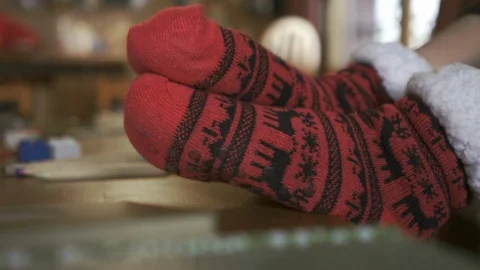 Chilling time - holidays with slippers on the table Stock Footage 104900189