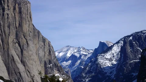 Chilly granite canyon showcasing rugged cliffs and serene winter scenery Видео 342923954