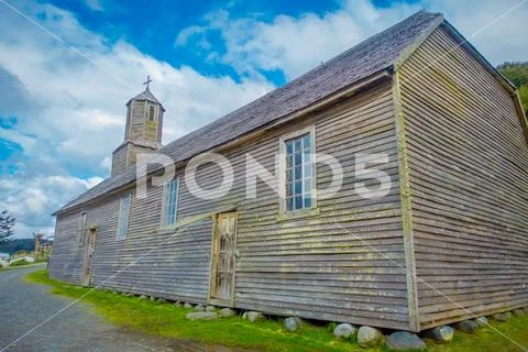CHILOE, CHILE - SEPTEMBER, 27, 2018: Outdoor side view of quinchao church, one Stock Photos
