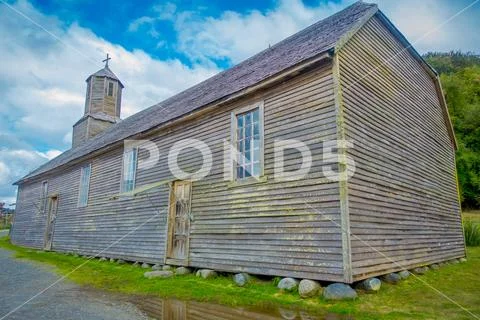 CHILOE, CHILE - SEPTEMBER, 27, 2018: Outdoor side view of quinchao church, one Stock Photos