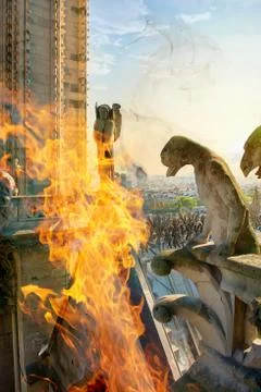 Chimeras in fire on Notre Dame Stock Photos