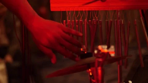 Chimes Playing, Slow Motion, Red Light  HD Stock Footage 82941199
