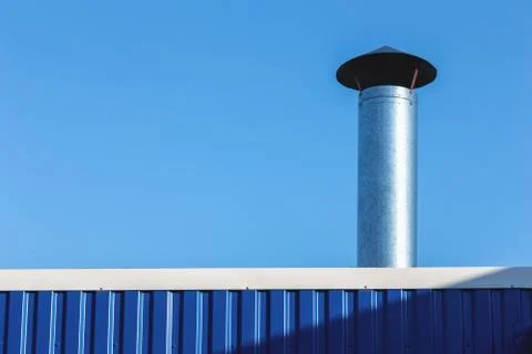 Chimney on building rooftop Stock Photos