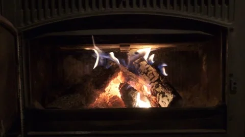 Chimney with burning trunks, slow motion Stock Footage 202632477
