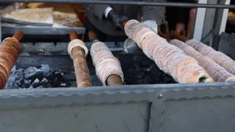 Chimney cake baking Easter market Stock Footage 331812126