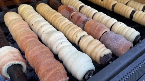Chimney cake machine close up video Stock Footage 340960734